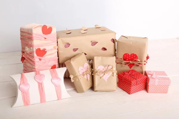 Beautiful gift box on wooden table. Valentine Day concept — Stock Photo, Image