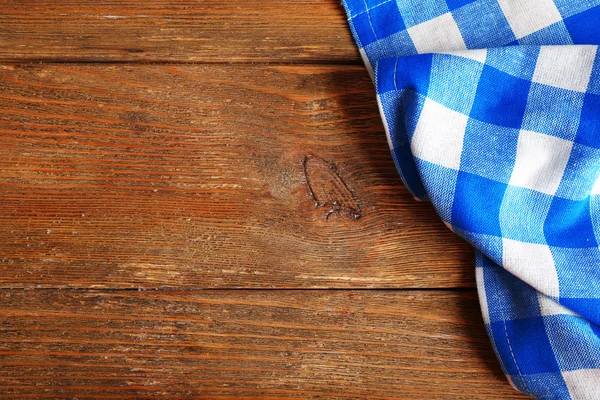 Napkin on wooden background — Stock Photo, Image