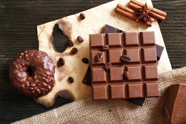 Still life with set van chocolade op tafel, bovenaanzicht — Stockfoto