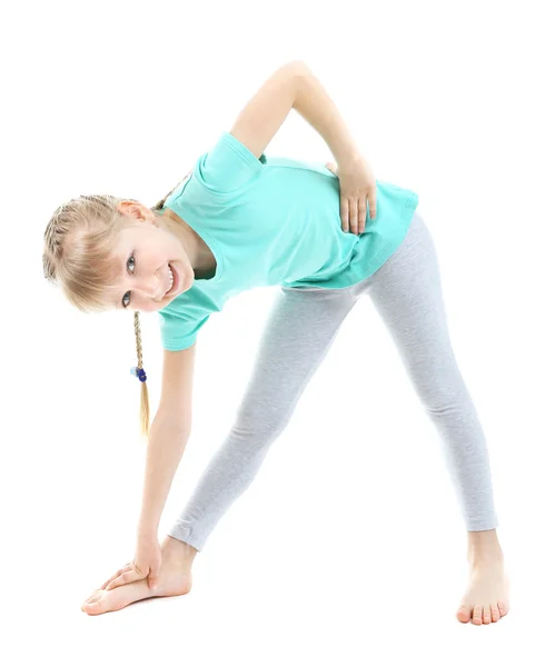 Little girl doing exercises — Stock Photo, Image