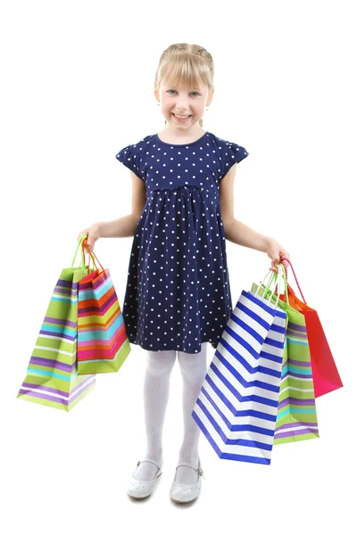 Küçük kız alışveriş torbaları — Stok fotoğraf