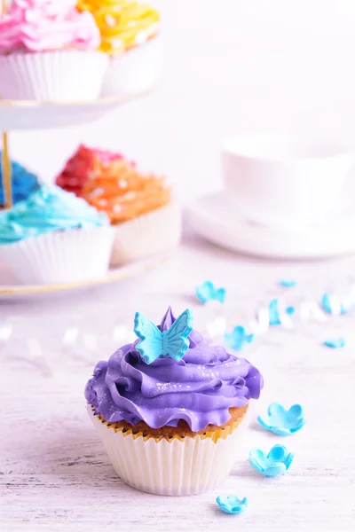 Delicious cupcakes on table close-up — Stock Photo, Image