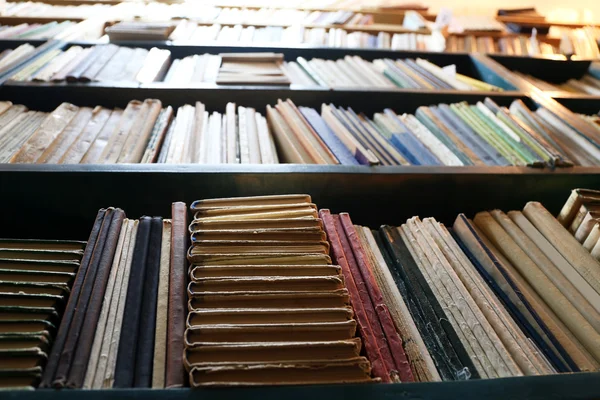 Many books on bookshelf in library — Stock Photo, Image