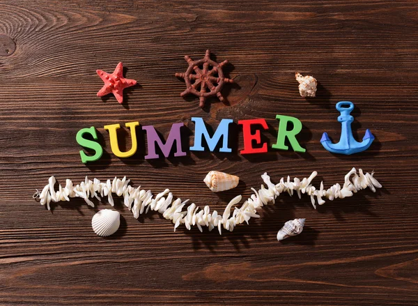 Word summer on wooden background — Stock Photo, Image