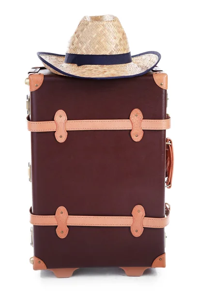 Suitcase and straw hat — Stock Photo, Image