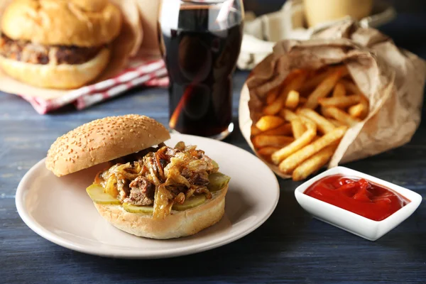 Tasty burger and french fries — Stock Photo, Image