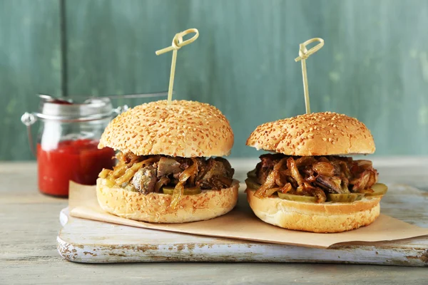 Tasty sandwich on cutting board — Stock Photo, Image