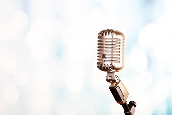 Retro microphone on blurred background — Stock Photo, Image