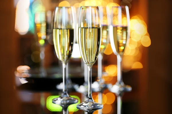 Glasses of champagne on bar — Stock Photo, Image