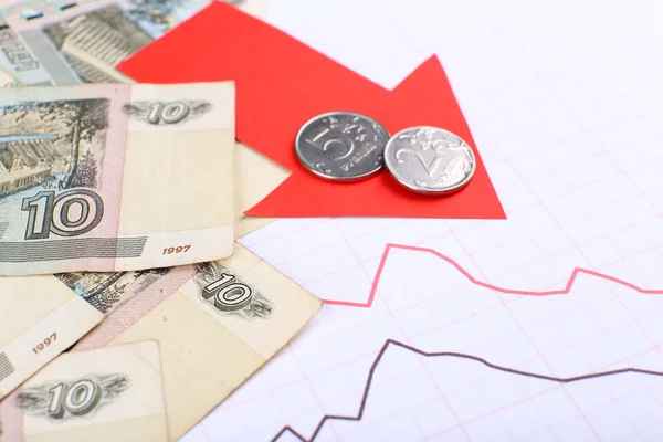 Money and red arrow on graph document close up — Stock Photo, Image