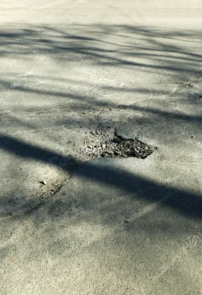 Very bad quality road with potholes — Stock Photo, Image