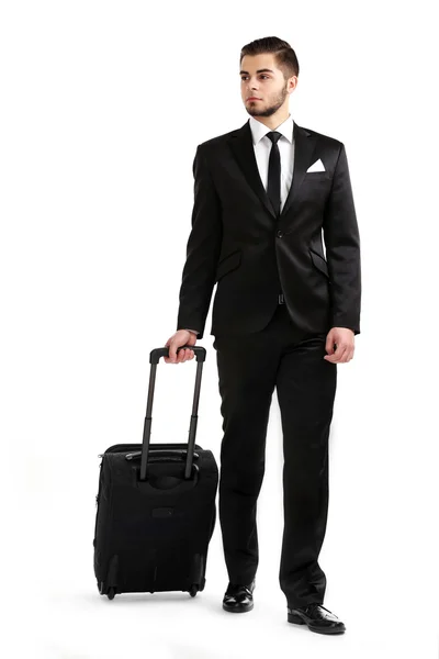 Elegante hombre de traje con maleta aislada en blanco — Foto de Stock