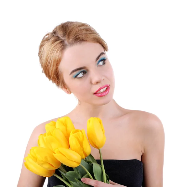 Porträt einer jungen Frau mit Tulpen auf weißem Grund — Stockfoto