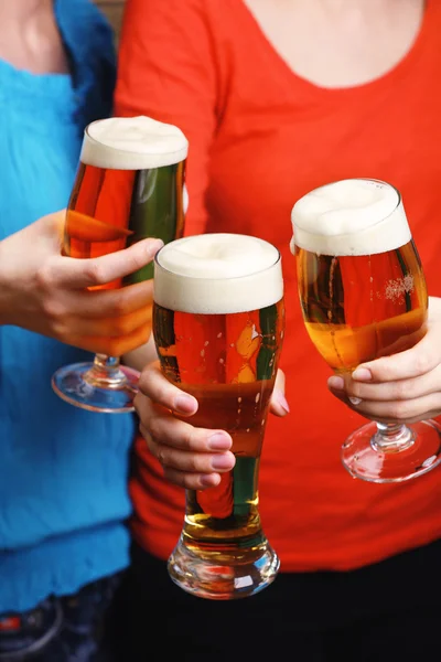 Beer in female hands, closeup — Stock Photo, Image