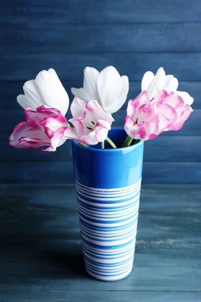 Beautiful tulips on wooden background — Stock Photo, Image