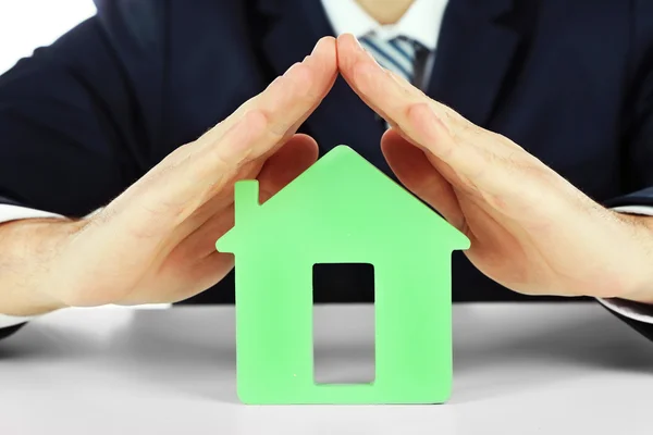 Male hands with model of house, closeup — Stock Photo, Image