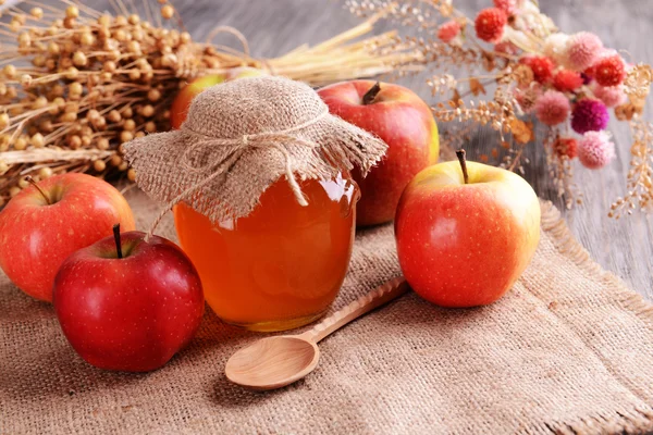 Delicious honey with apple on table close-up — Stock Photo, Image