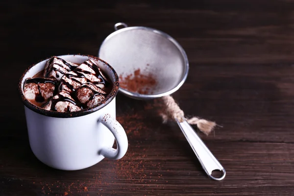 Mug of cocoa with marshmallows on wooden background — Stock Photo, Image