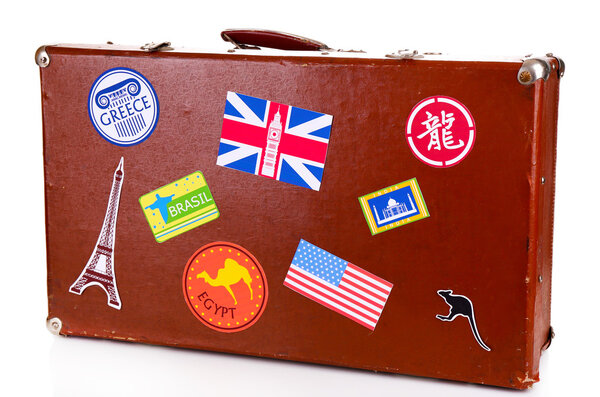 Suitcase with stickers isolated on white