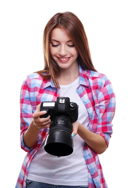 Joven fotógrafa tomando fotos aisladas en blanco — Foto de Stock