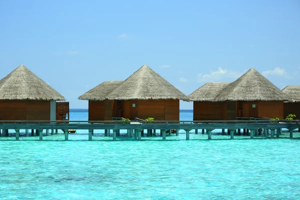 Villas de agua sobre fondo marino — Foto de Stock