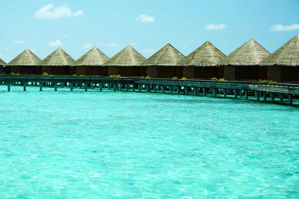 Villas de agua sobre fondo marino — Foto de Stock