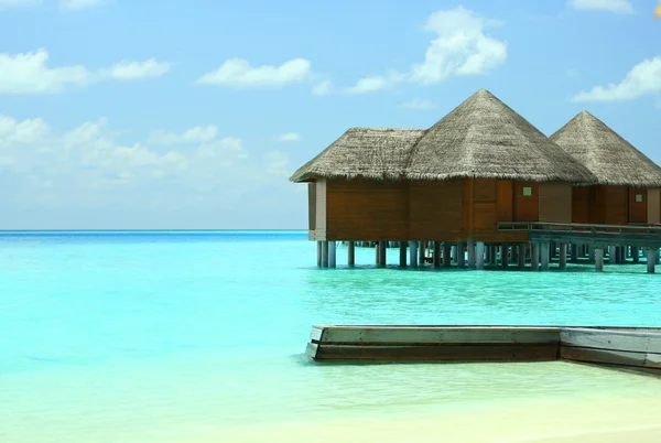 Villas de agua sobre fondo marino — Foto de Stock