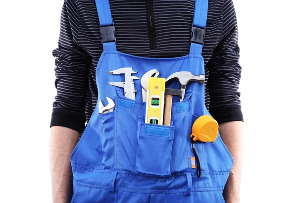 Mann in Overalls mit Werkzeug — Stockfoto