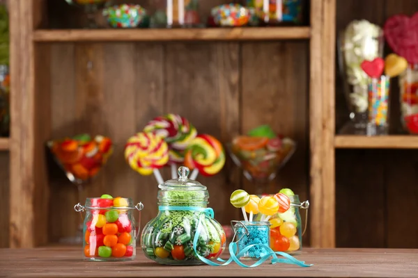 Colorful candies in jars — Stock Photo, Image