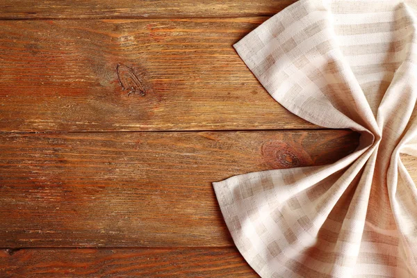 餐巾放在木制的背景 — 图库照片