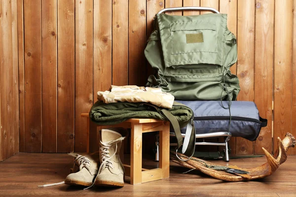 Hunting gear on wooden background — Stock Photo, Image