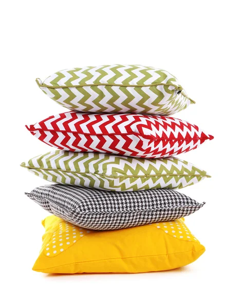 Pilha de travesseiros coloridos isolados em branco — Fotografia de Stock