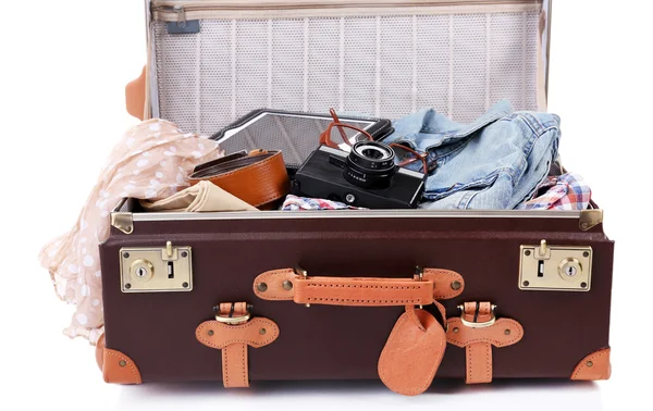 Packing suitcase for trip isolated on white — Stock Photo, Image