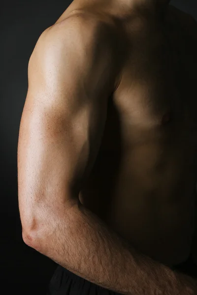 Muscle young man close up — Stock Photo, Image