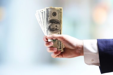 El ışık arka plan bulanık para ile