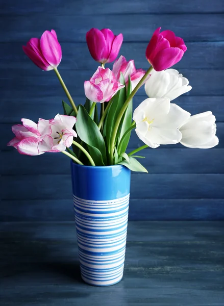 Beautiful tulips on wooden background — Stock Photo, Image