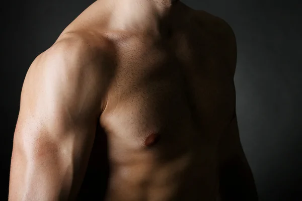 Muscle young man close up — Stock Photo, Image
