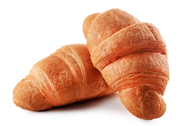 Vynikající croissanty izolovaných na bílém — Stock fotografie