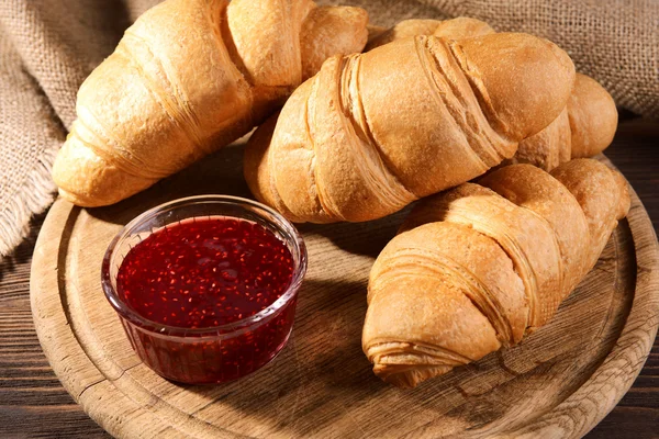 Delicious croissants on table close-up — Stock Photo, Image