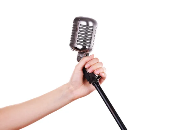 Microfone retrô na mão feminina isolado em branco — Fotografia de Stock