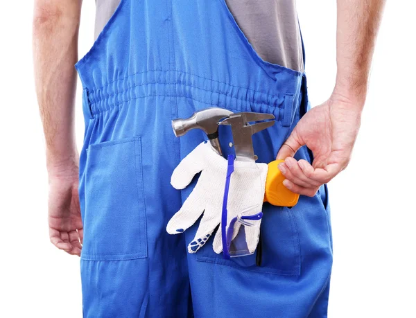 Homem de macacão com ferramentas no bolso isolado em branco — Fotografia de Stock