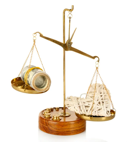 Money and heart in balance scales — Stock Photo, Image