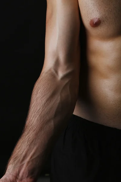 Muscle young man close up — Stock Photo, Image