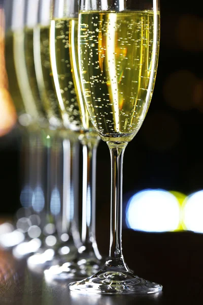 Glasses of champagne on bar background — Stock Photo, Image