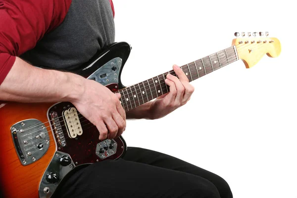 Young man playing on electric guitar isolated on white — Stock Photo, Image