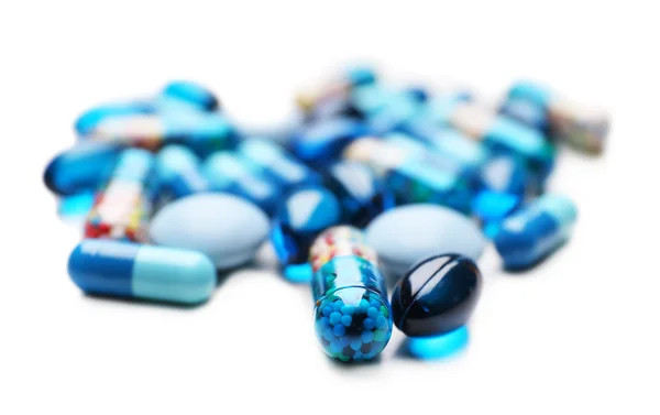 Montón de pastillas aisladas en blanco —  Fotos de Stock