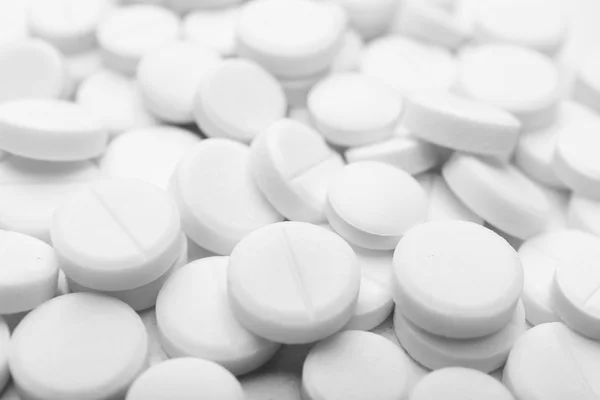 Pile of white pills, closeup — Stock Photo, Image