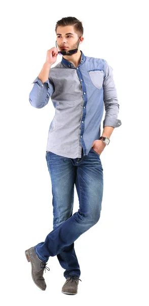 Mannen i blå skjorta och jeans isolerad på vit — Stockfoto