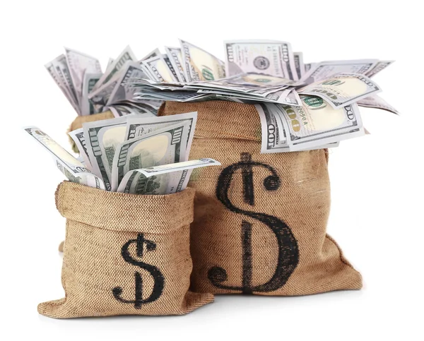 Dinero en bolsas aisladas en blanco —  Fotos de Stock