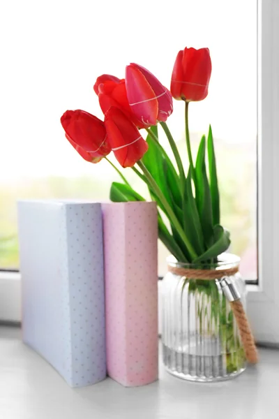 Still life with bouquet of fresh tulips on windowsill background — Stock Photo, Image